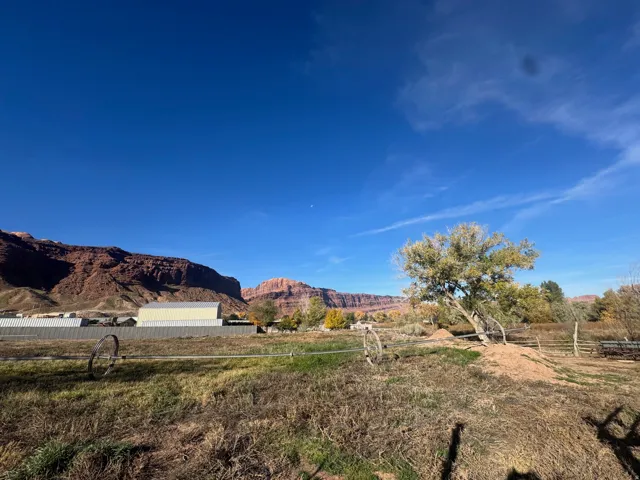 View of mountain background featuring rural landscape