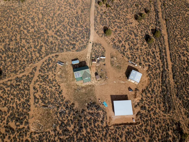 Aerial view of property's location with a desert landscape and rural landscape