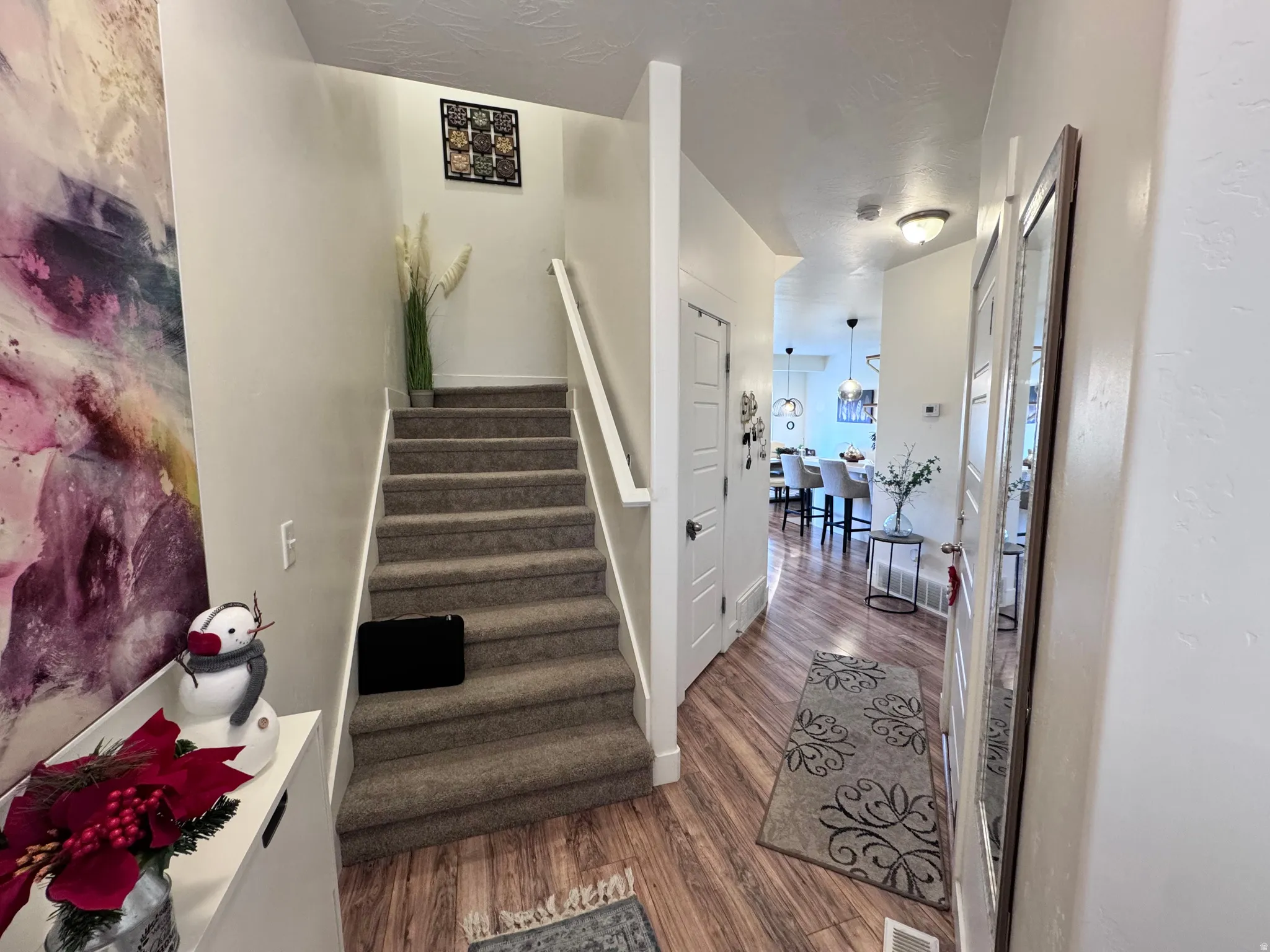 Stairs with wood finished floors