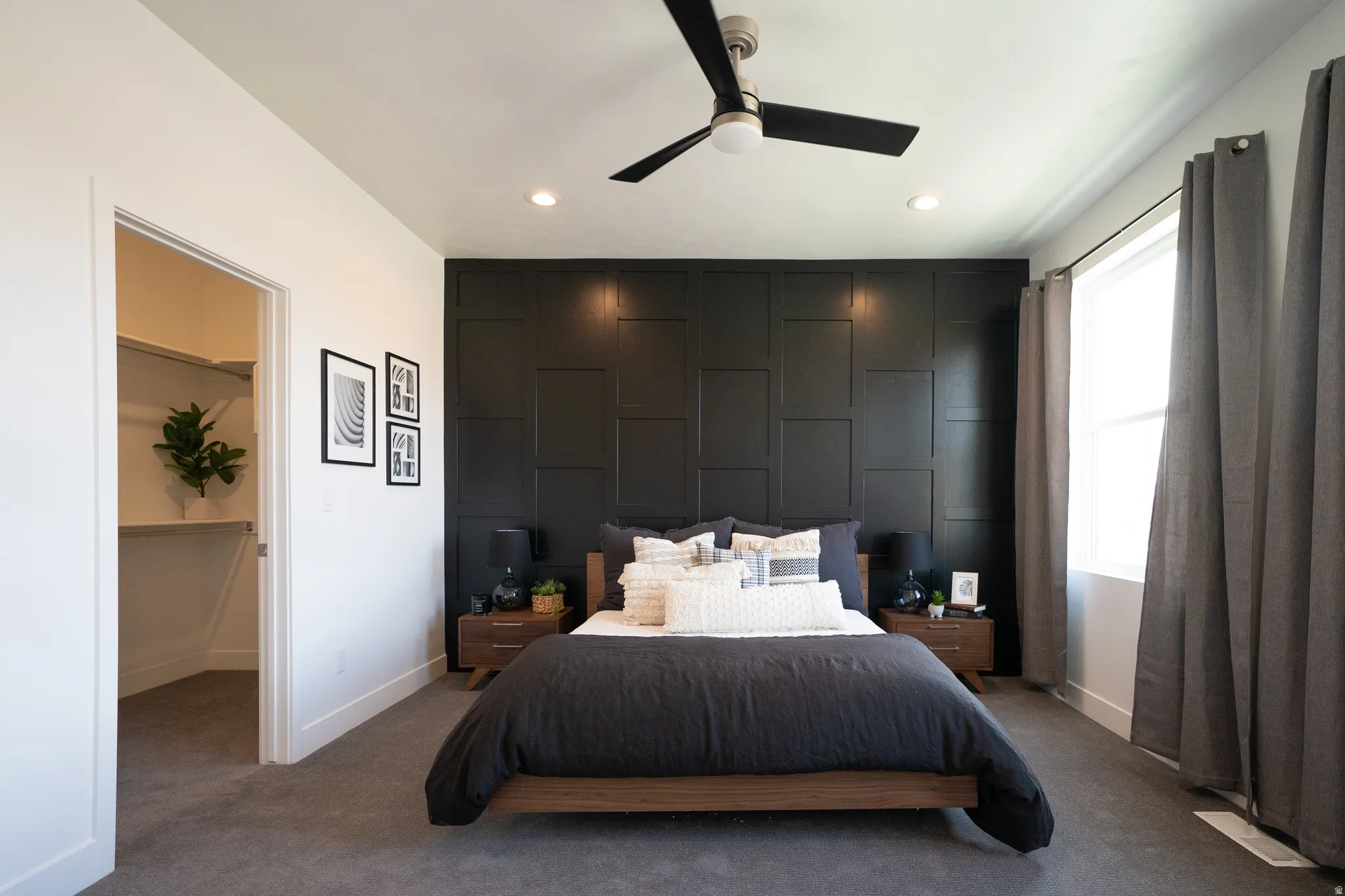 Bedroom with carpet flooring, a ceiling fan, and recessed lighting
