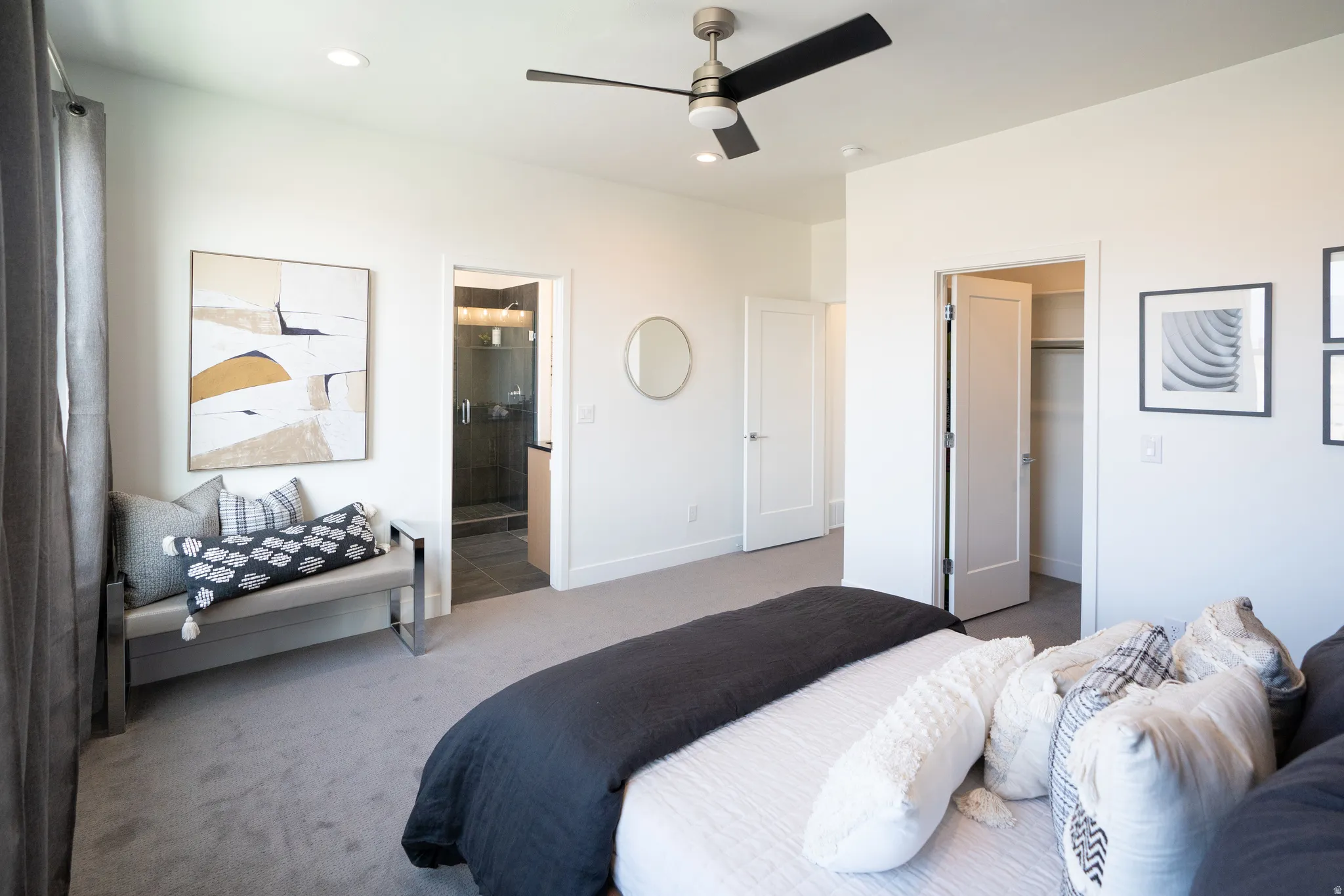 Carpeted bedroom featuring a spacious closet, a ceiling fan, recessed lighting, and connected bathroom