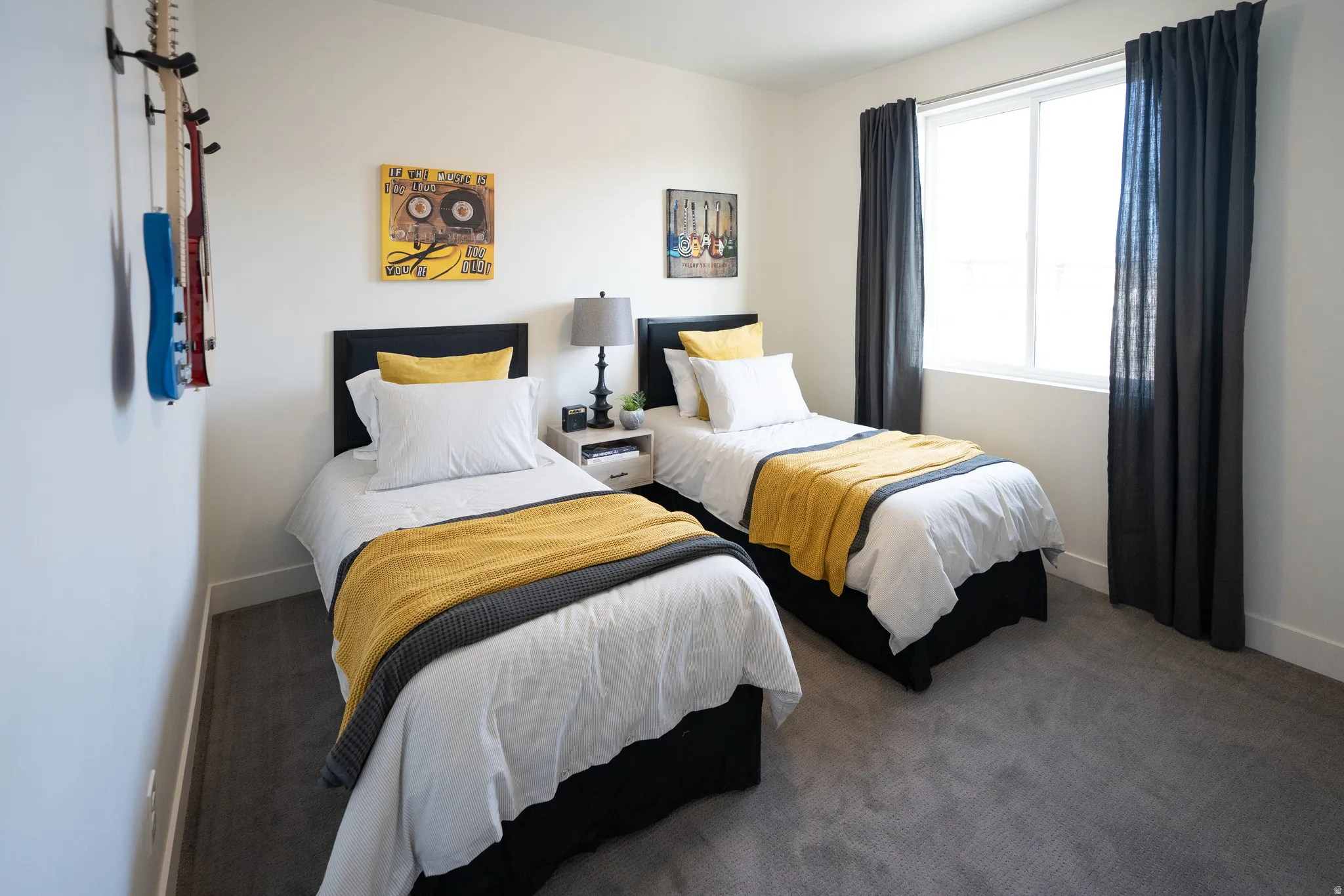 Carpeted bedroom with baseboards