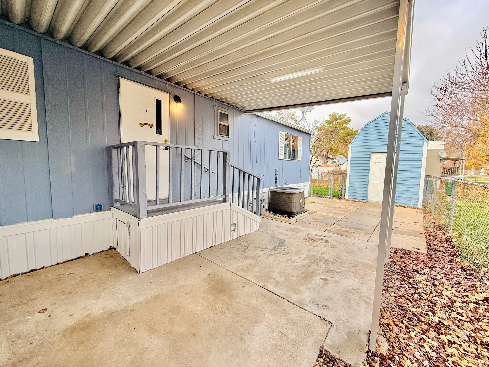View of patio featuring an outdoor structure