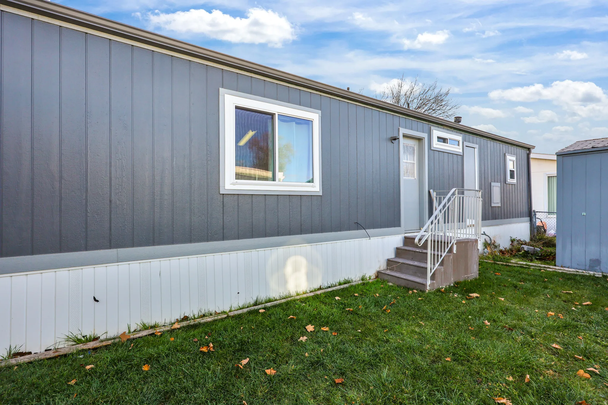 View of front of house with a front yard