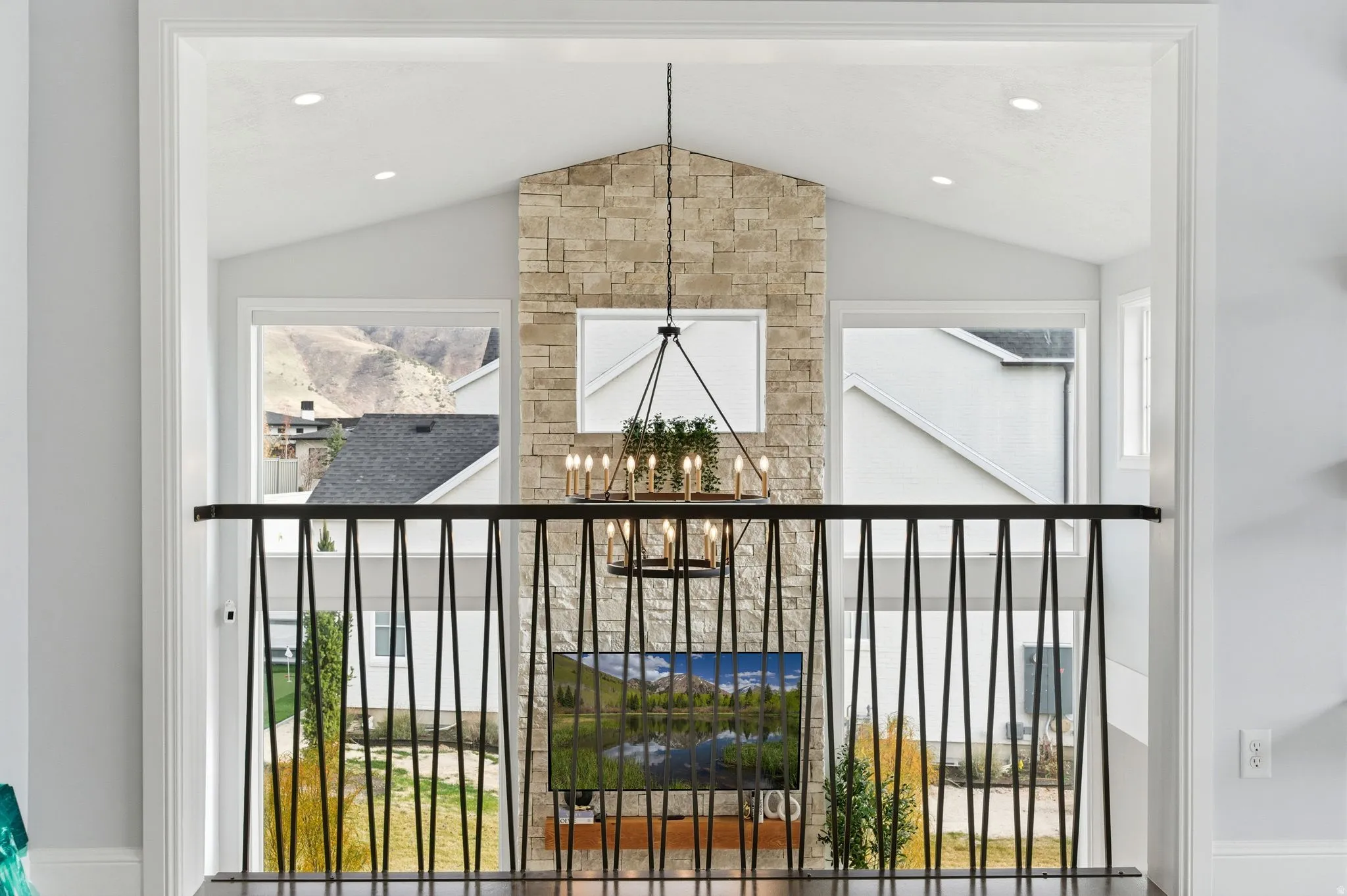 Detailed view of a chandelier and stone siding