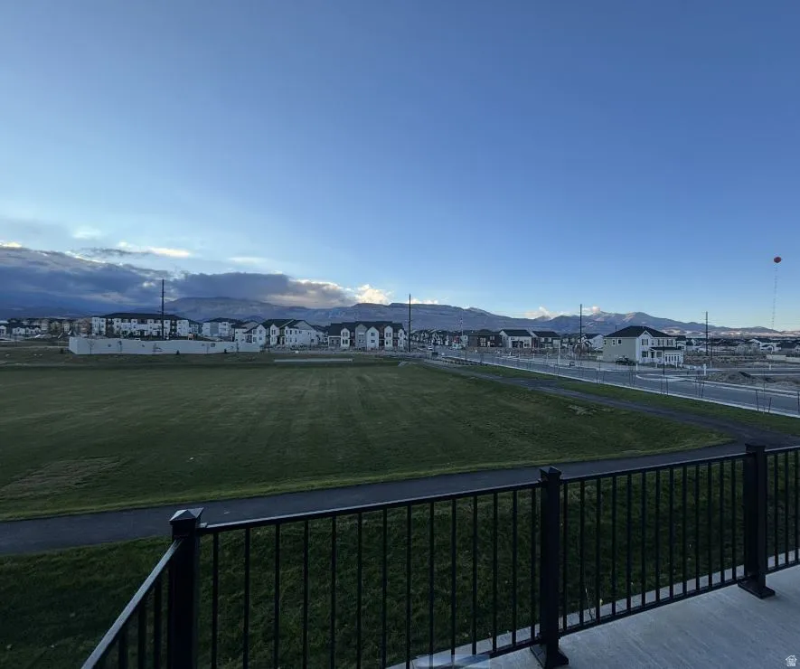View of mountain backdrop with nearby suburban area