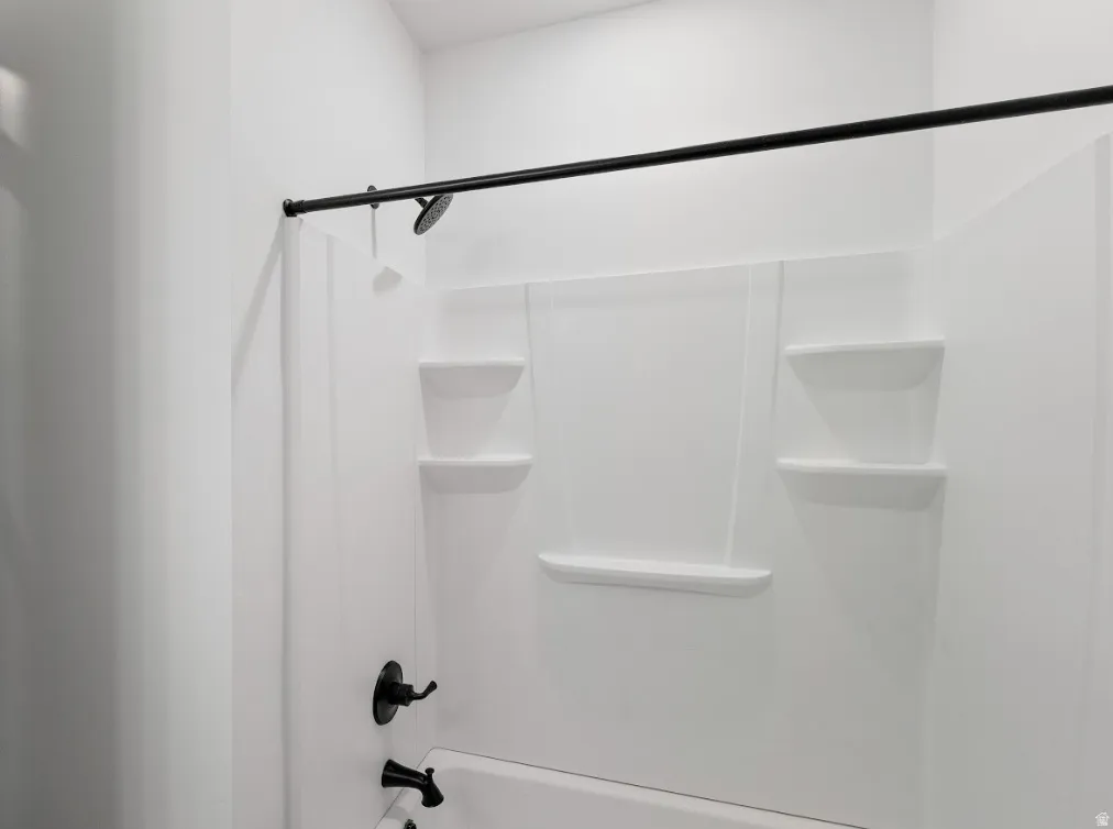 Bathroom featuring shower / bath combination