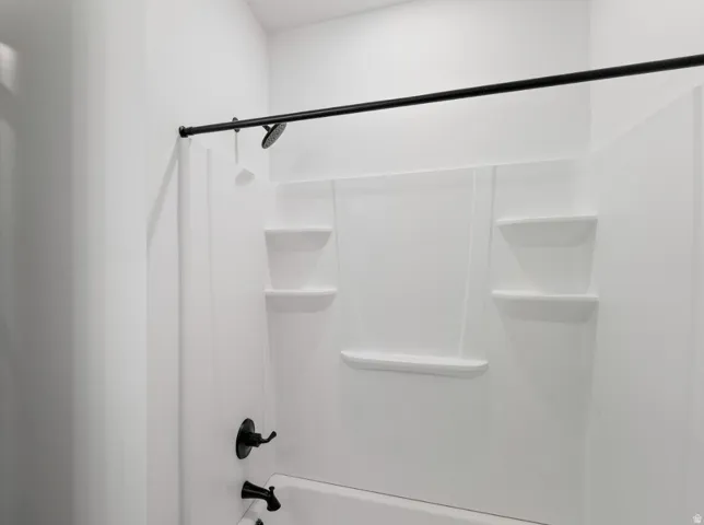 Bathroom featuring shower / bath combination