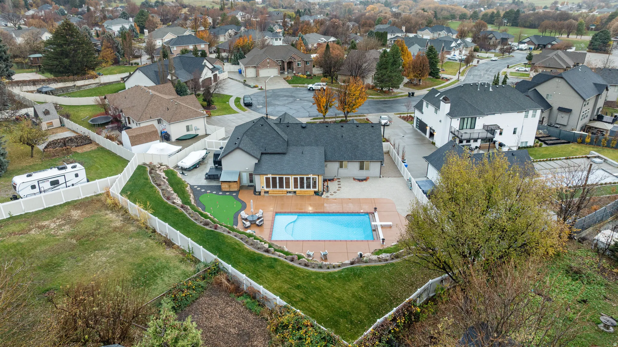 Aerial view of residential area with a pool area