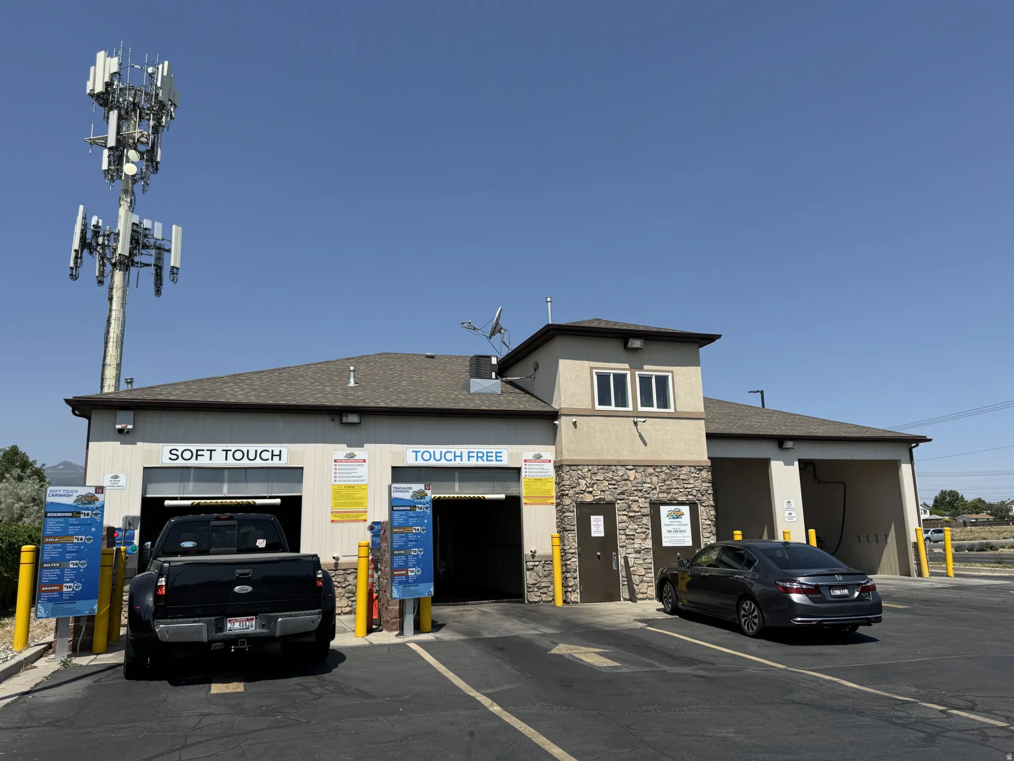 View of commercial property featuring an attached garage