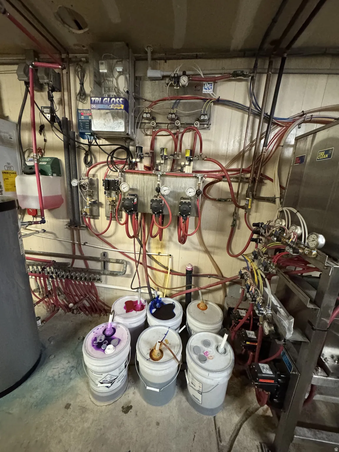 Utility room featuring water heater