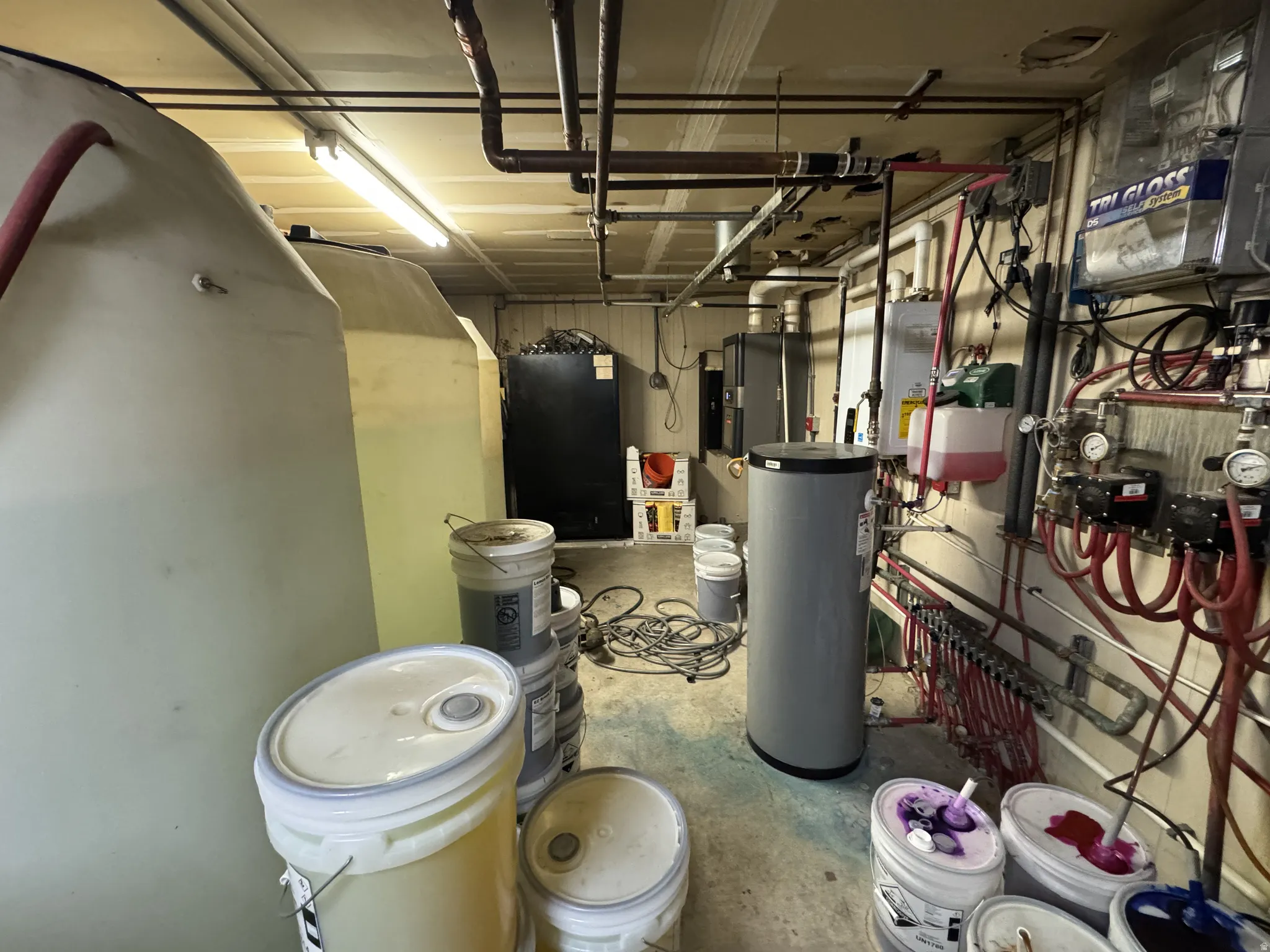 Utilities with water heater and tankless water heater