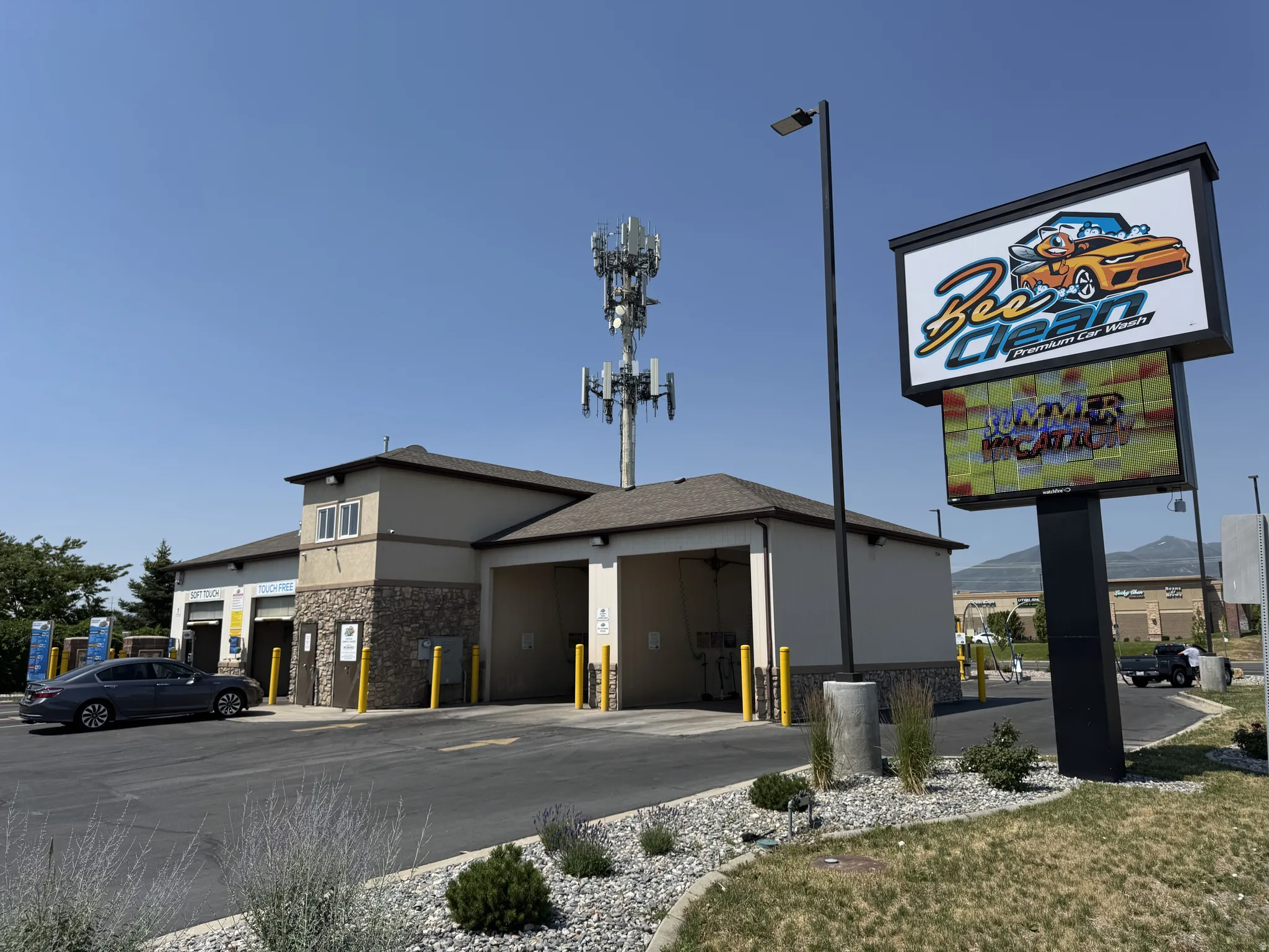 View of property with driveway