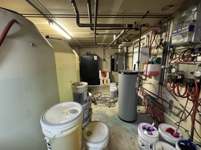 Utilities with water heater and tankless water heater