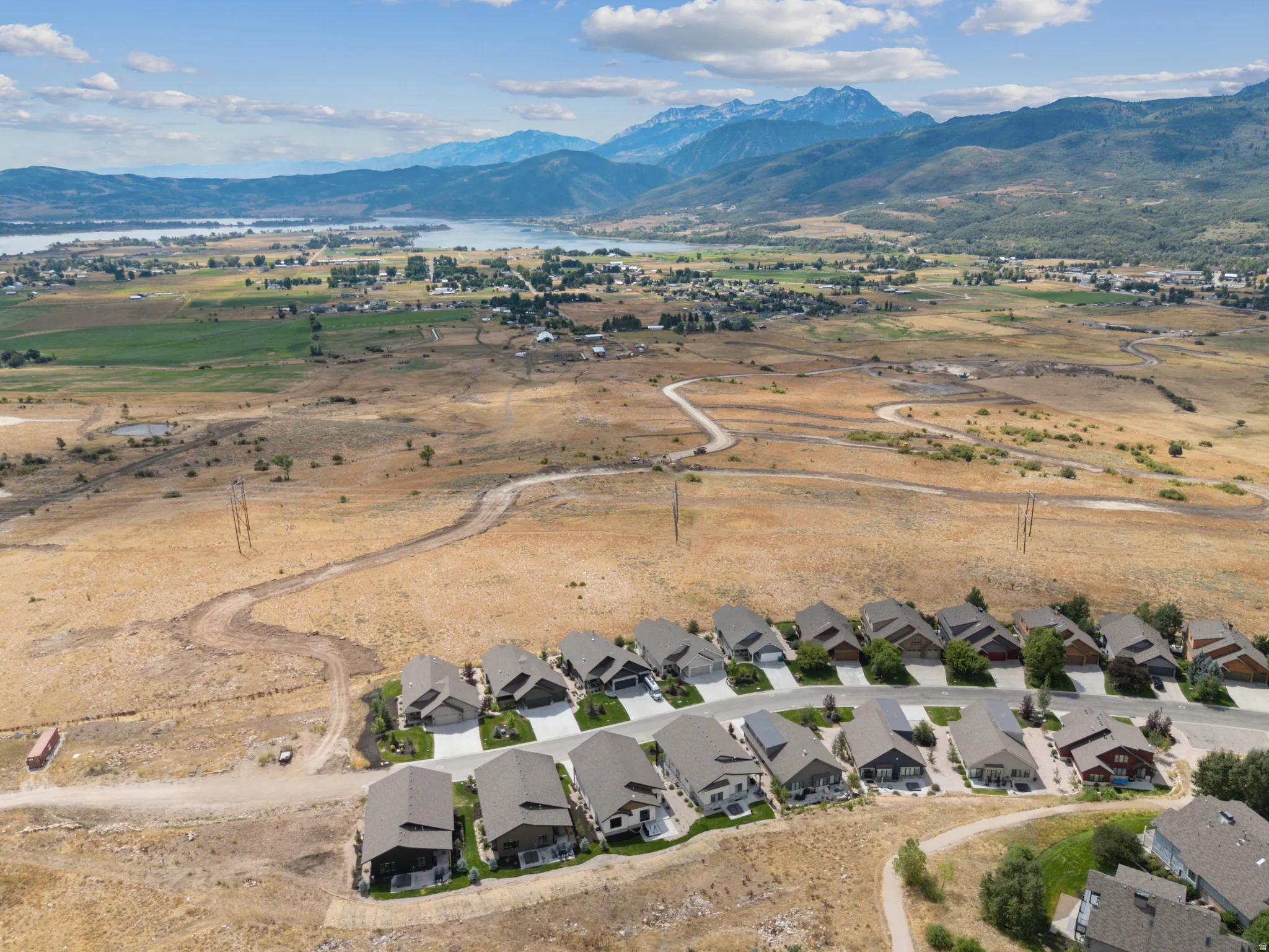 Aerial view of the Eden/Ogden Valley with views of Pineview and Snowbasin in the distance.