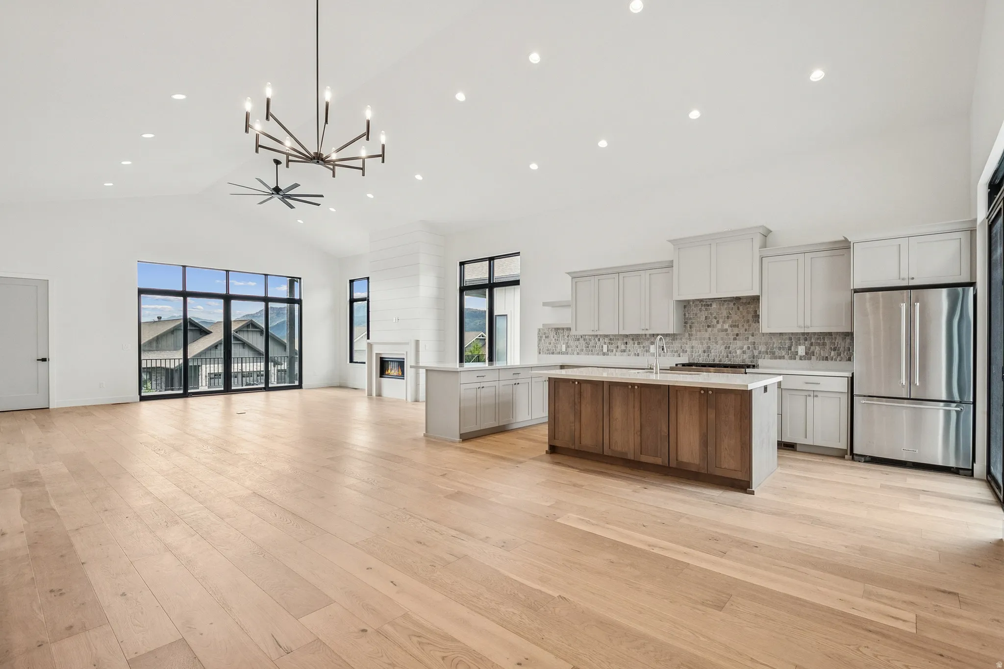 Large gathering family room, kitchen and eating area.