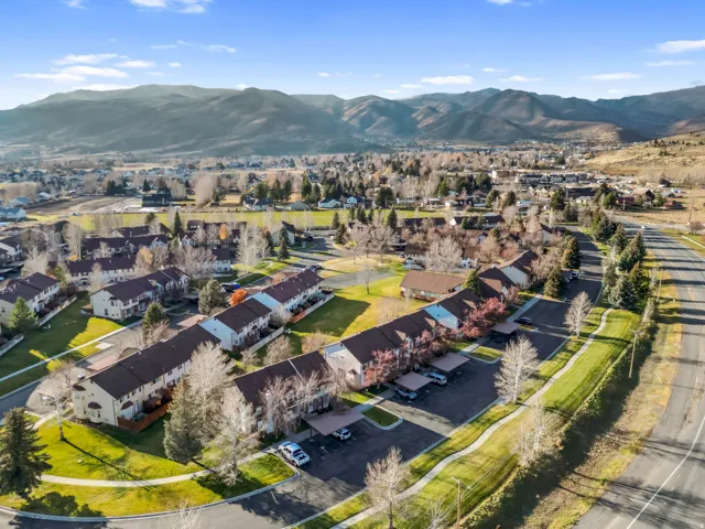 Aerial view of residential area with a mountain backdrop