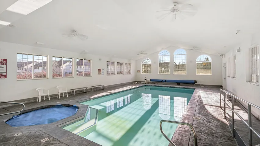 Indoor community pool with ceiling fan