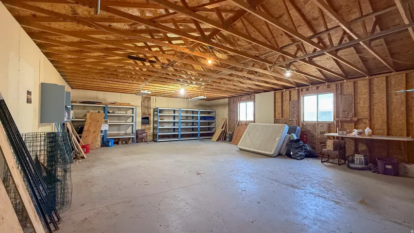 Misc room with concrete floors and a garage