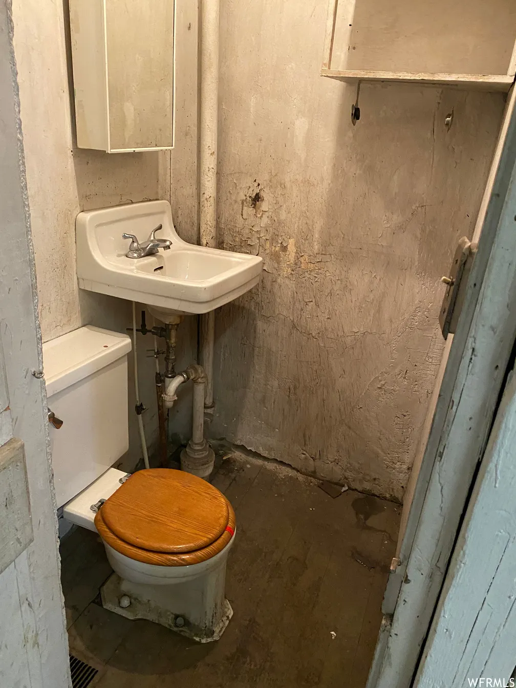 Half bathroom in warehouse