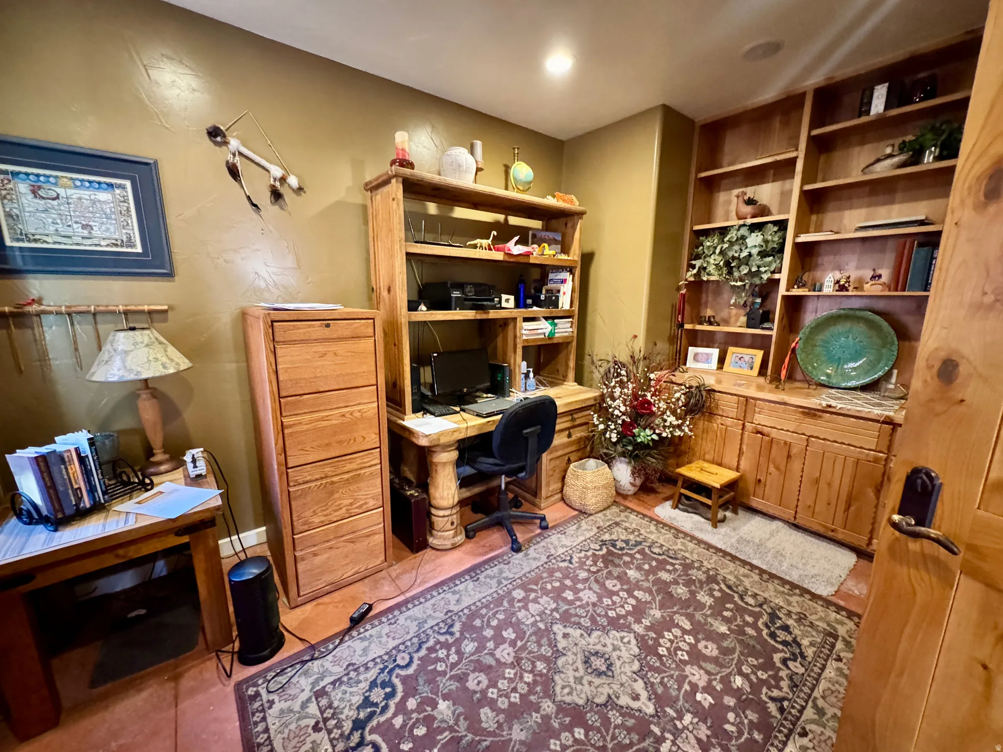 Office area with light tile patterned flooring