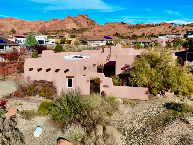 View of front of house featuring a mountain view and stucco siding