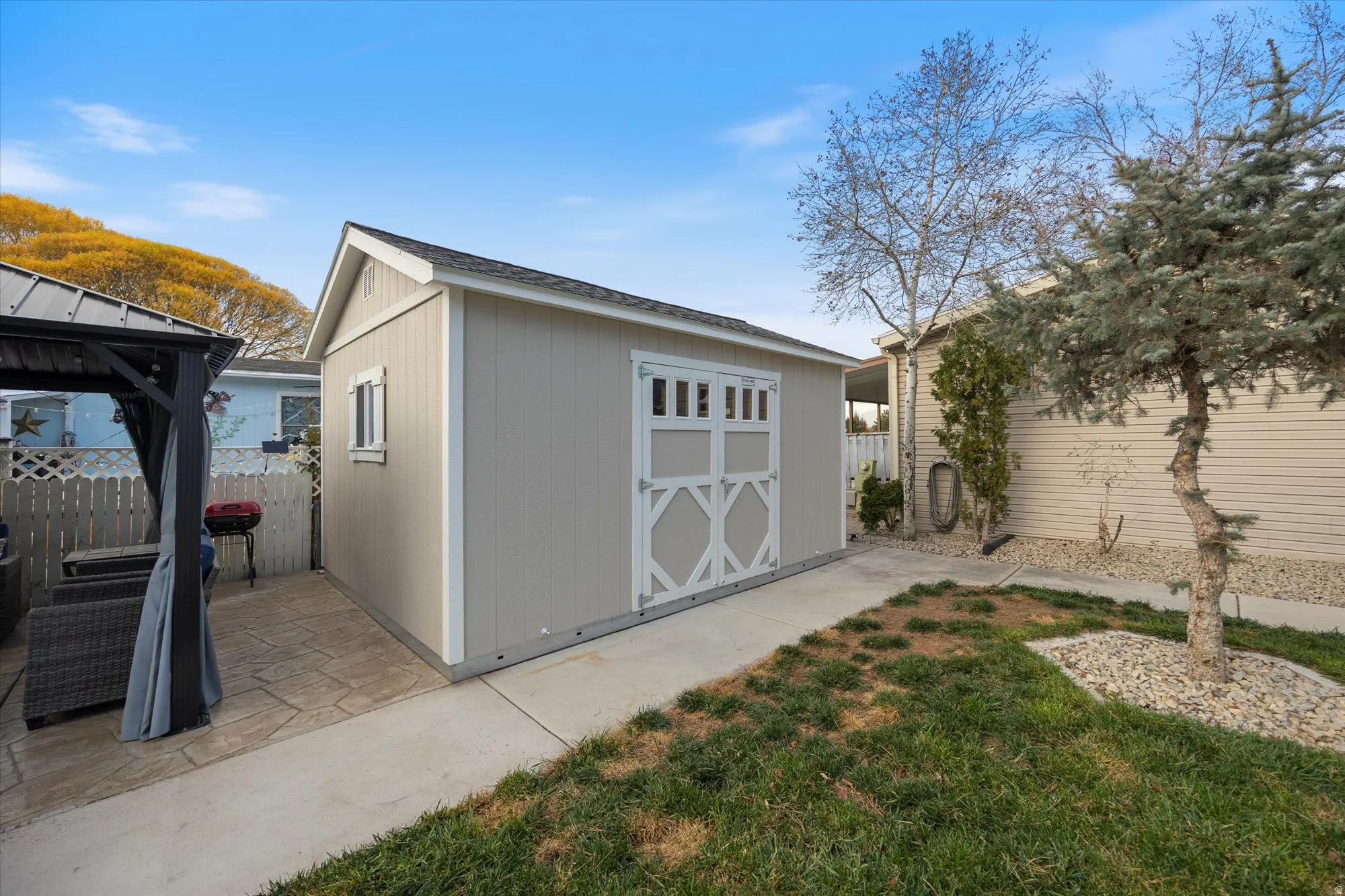 Garage with a storage shed