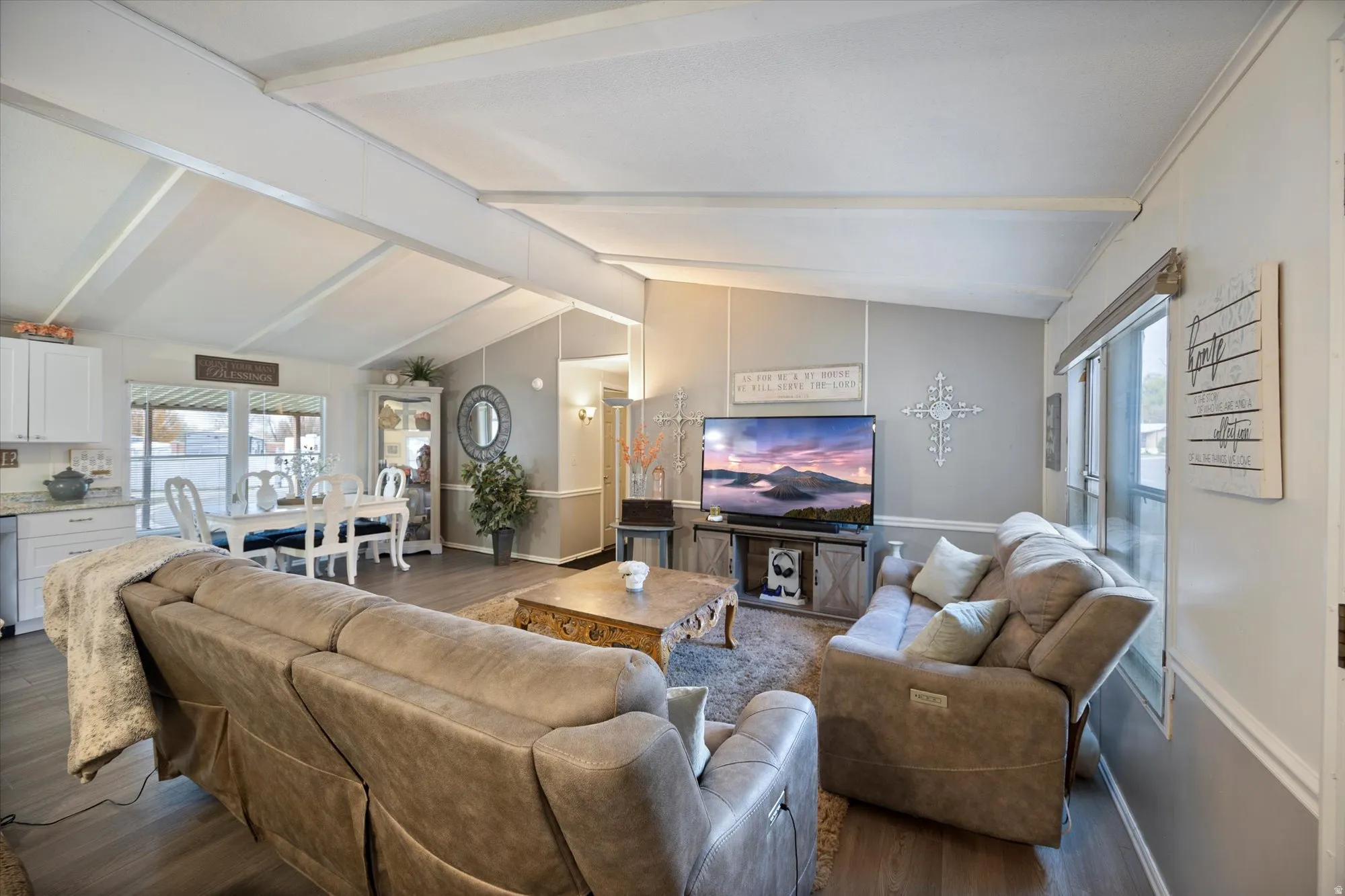 Living area featuring dark wood-style flooring