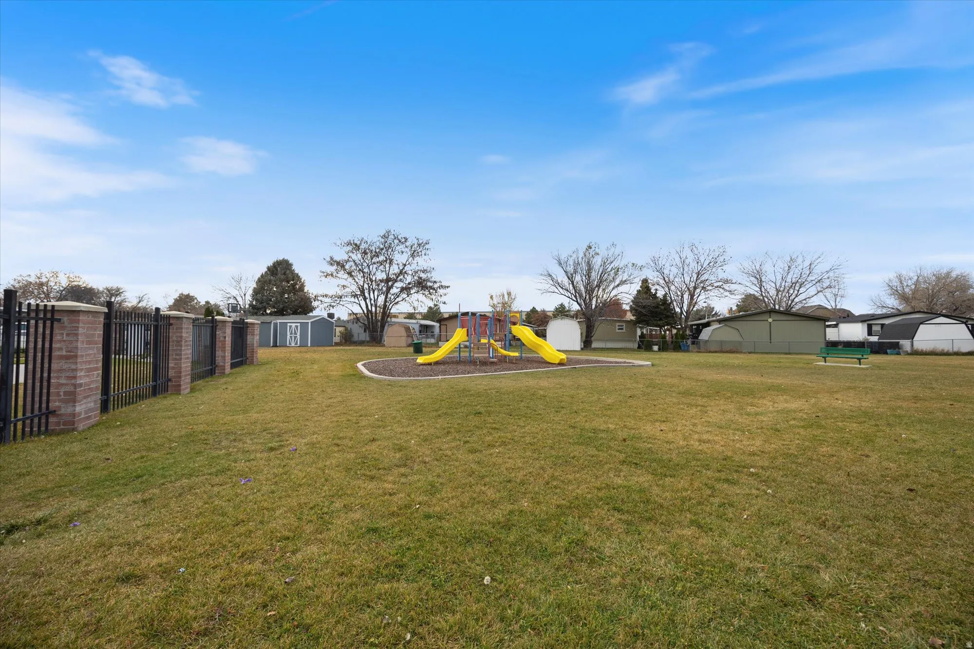 View of community yard featuring a shed