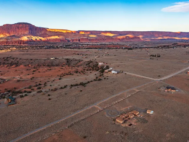 Overview of rural landscape with a desert landscape and a mountainous background