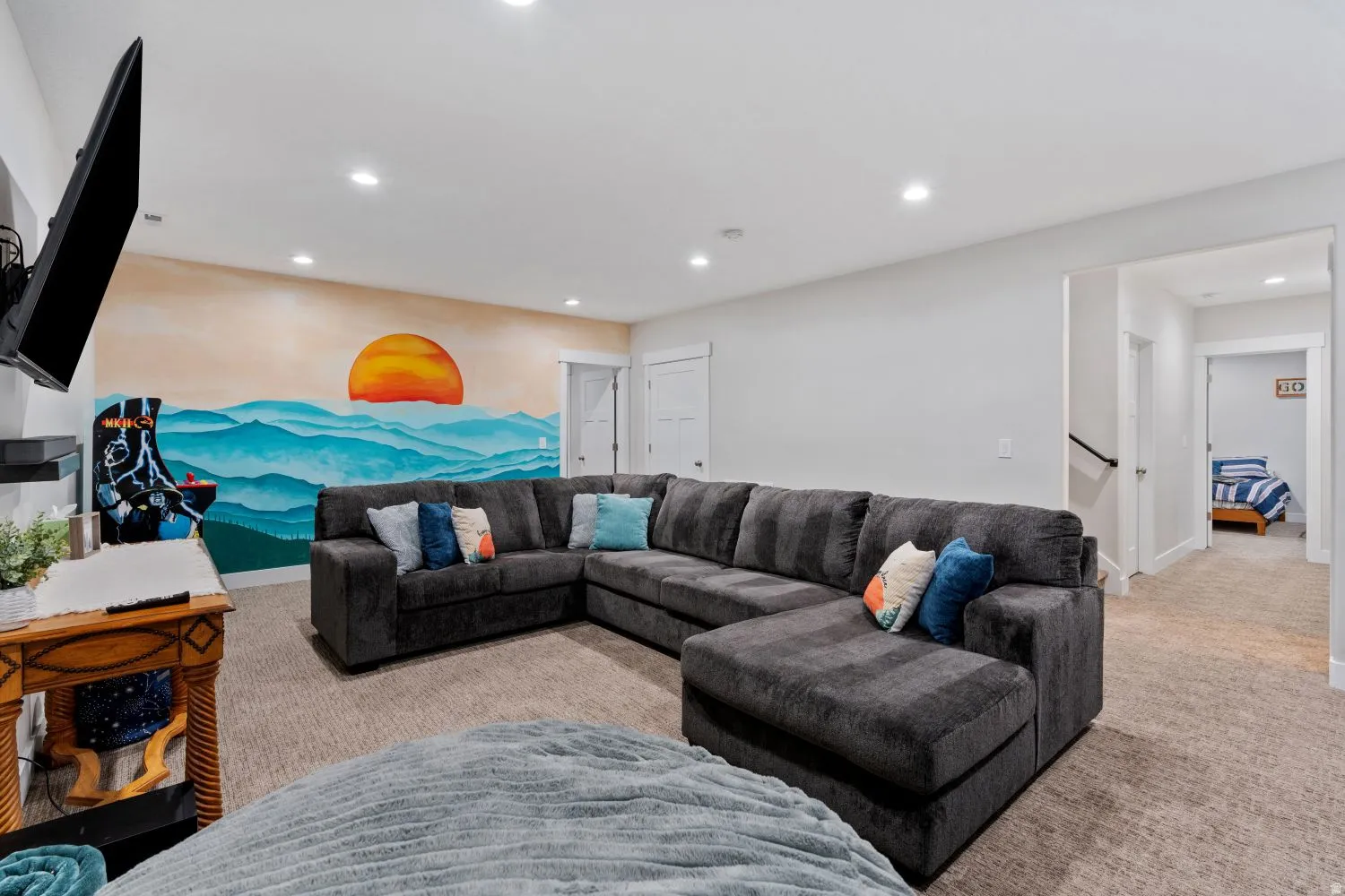 Carpeted living room featuring recessed lighting