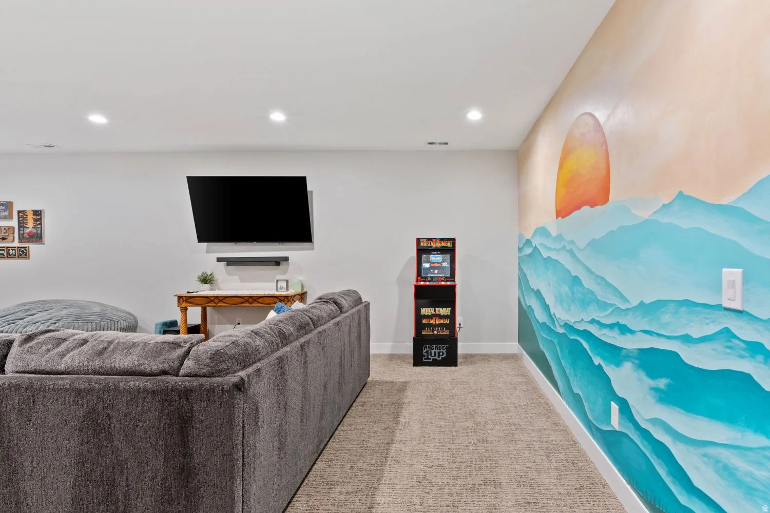 Living area featuring recessed lighting and light colored carpet