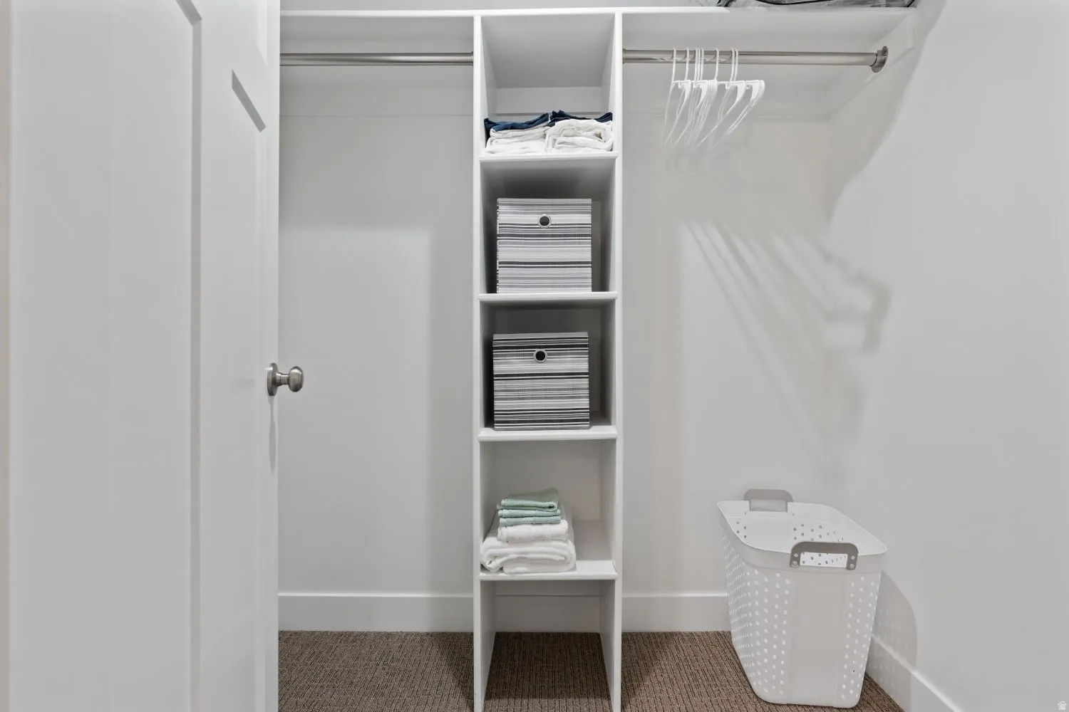 Walk in closet featuring carpet floors