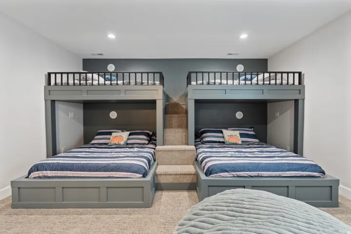 Carpeted bedroom with baseboards