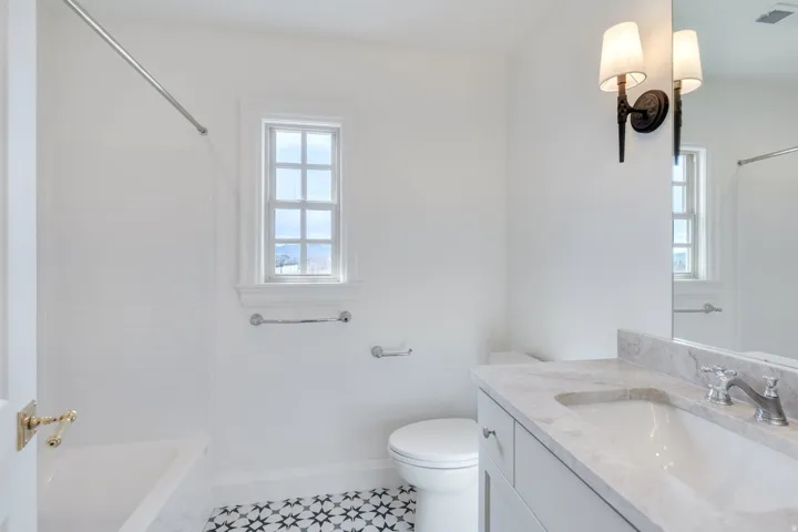 Full bathroom featuring vanity and tub / shower combination
