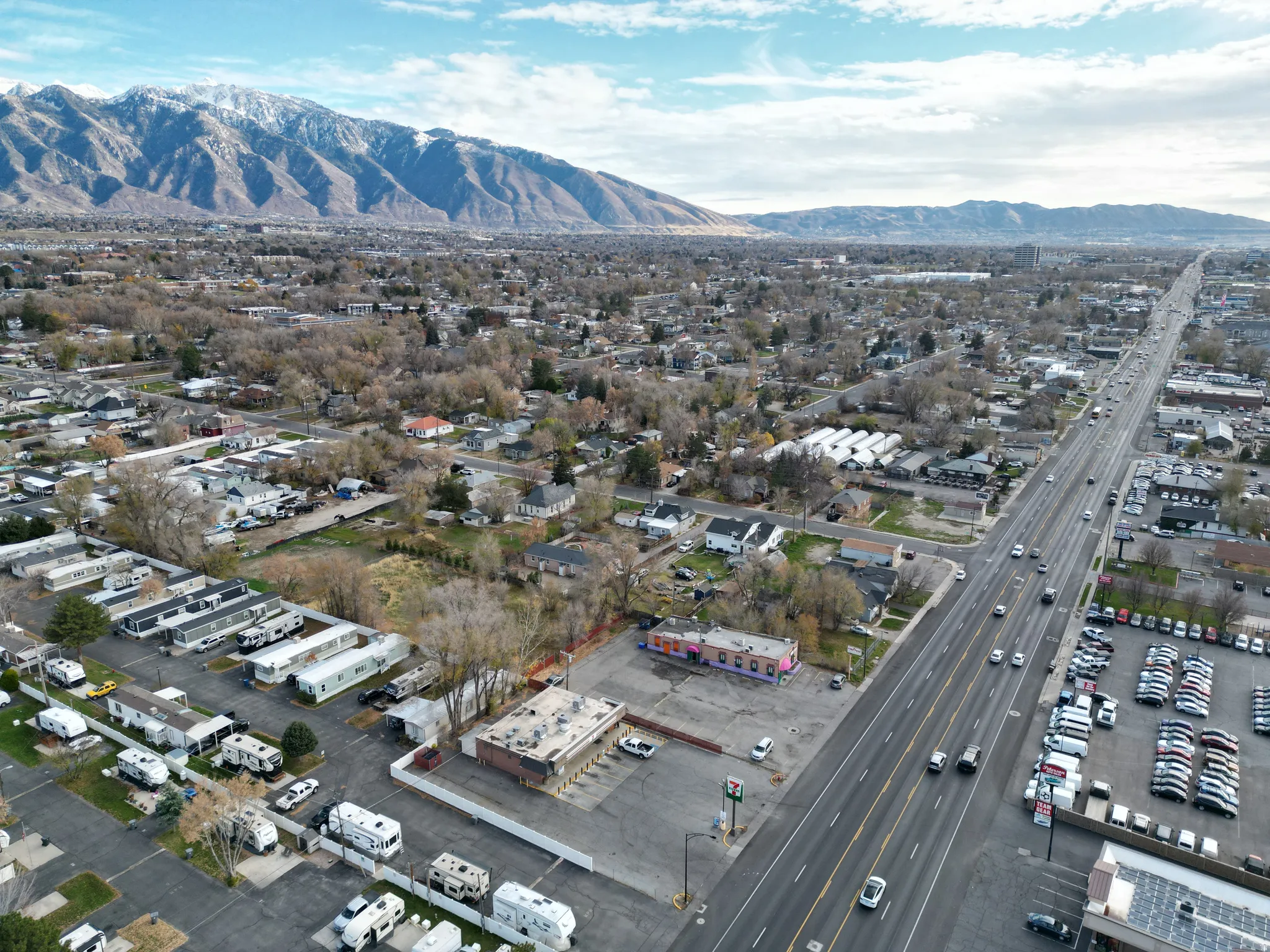 Aerial overview of property's location with a mountainous background