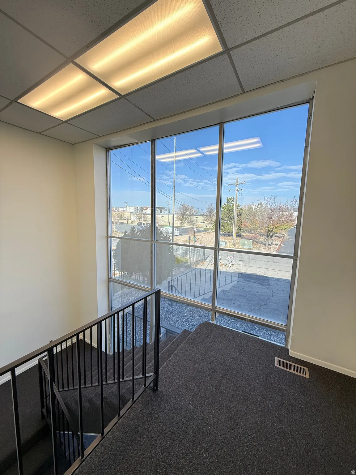Spare room featuring a paneled ceiling