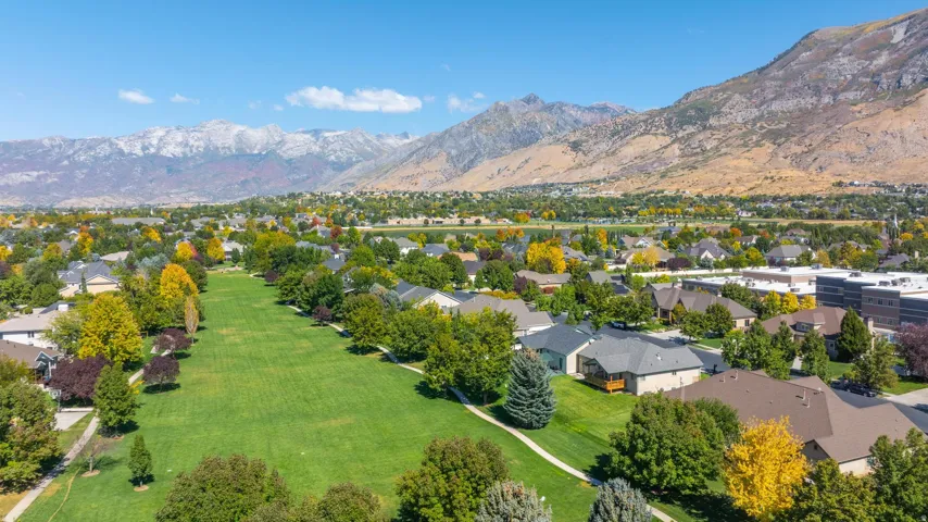 Aerial view of residential area with a mountain backdrop