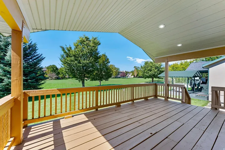 Deck featuring a yard