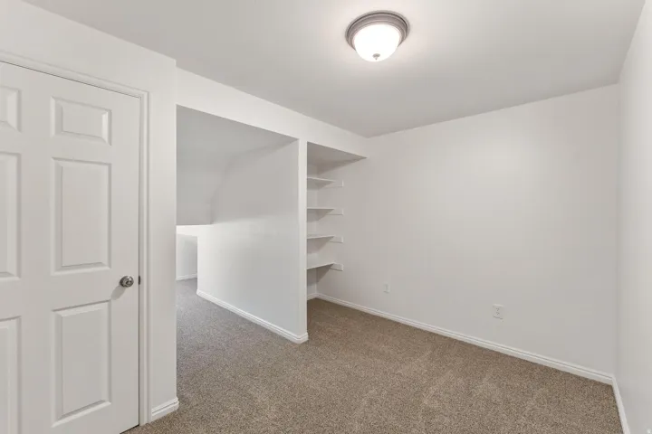 Interior space with light colored carpet