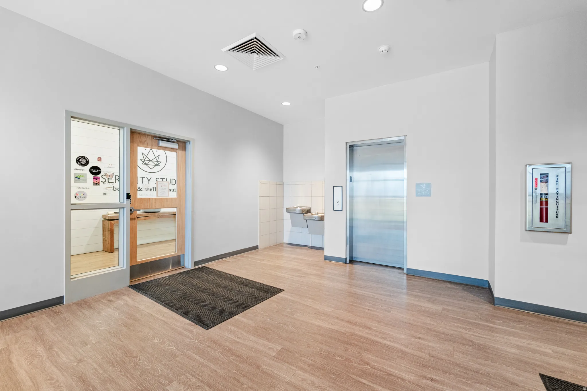 Building lobby featuring recessed lighting