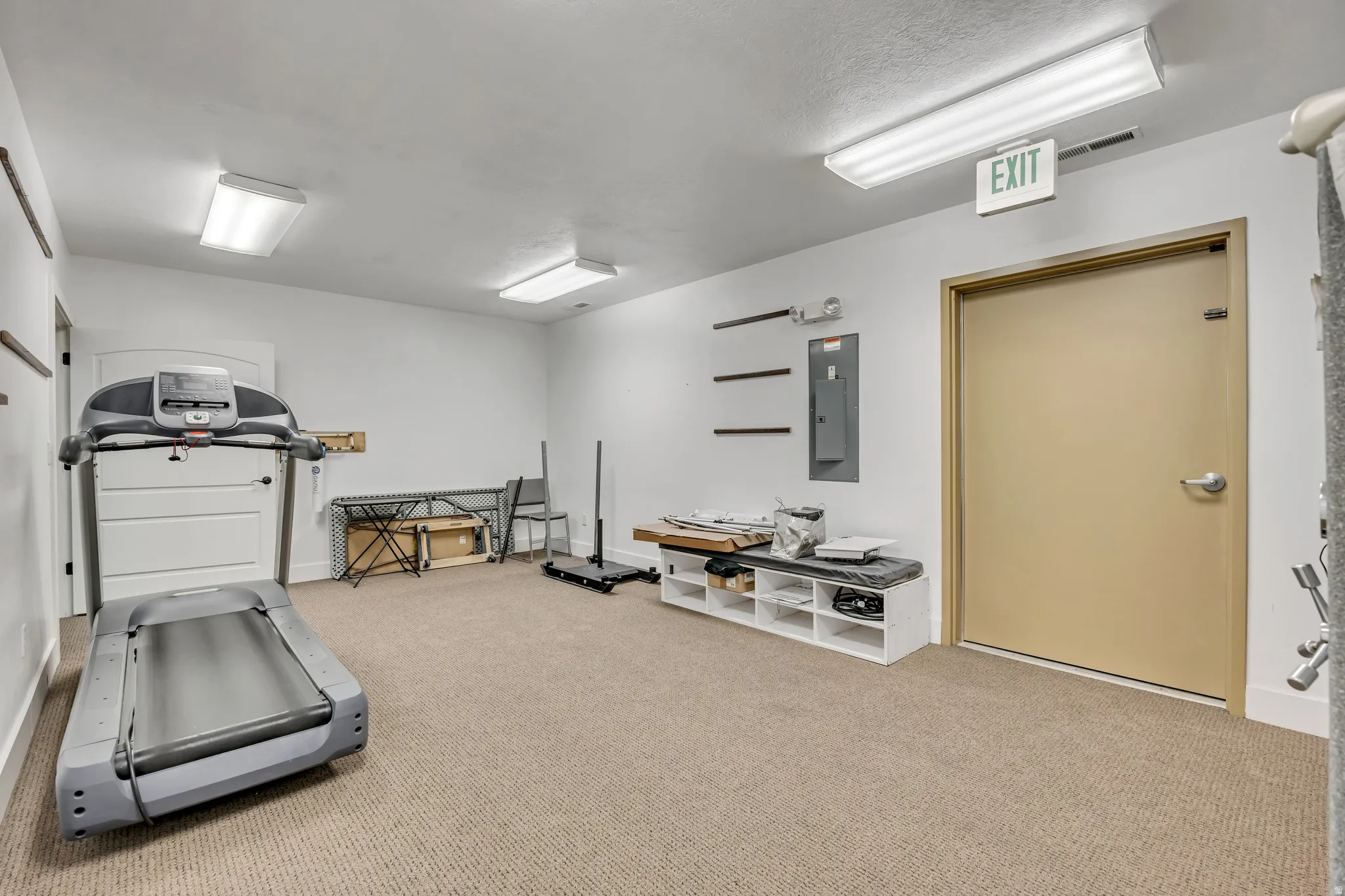 Exercise room with electric panel