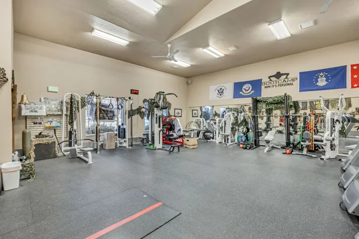 Workout area featuring a ceiling fan