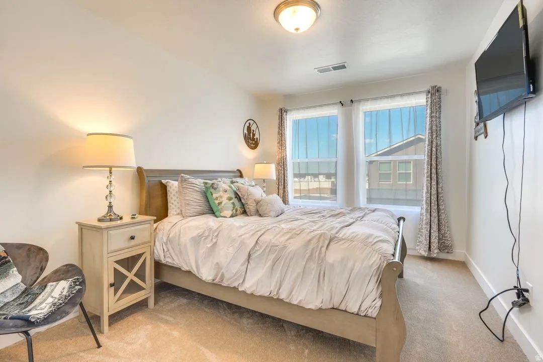 Bedroom featuring carpet flooring