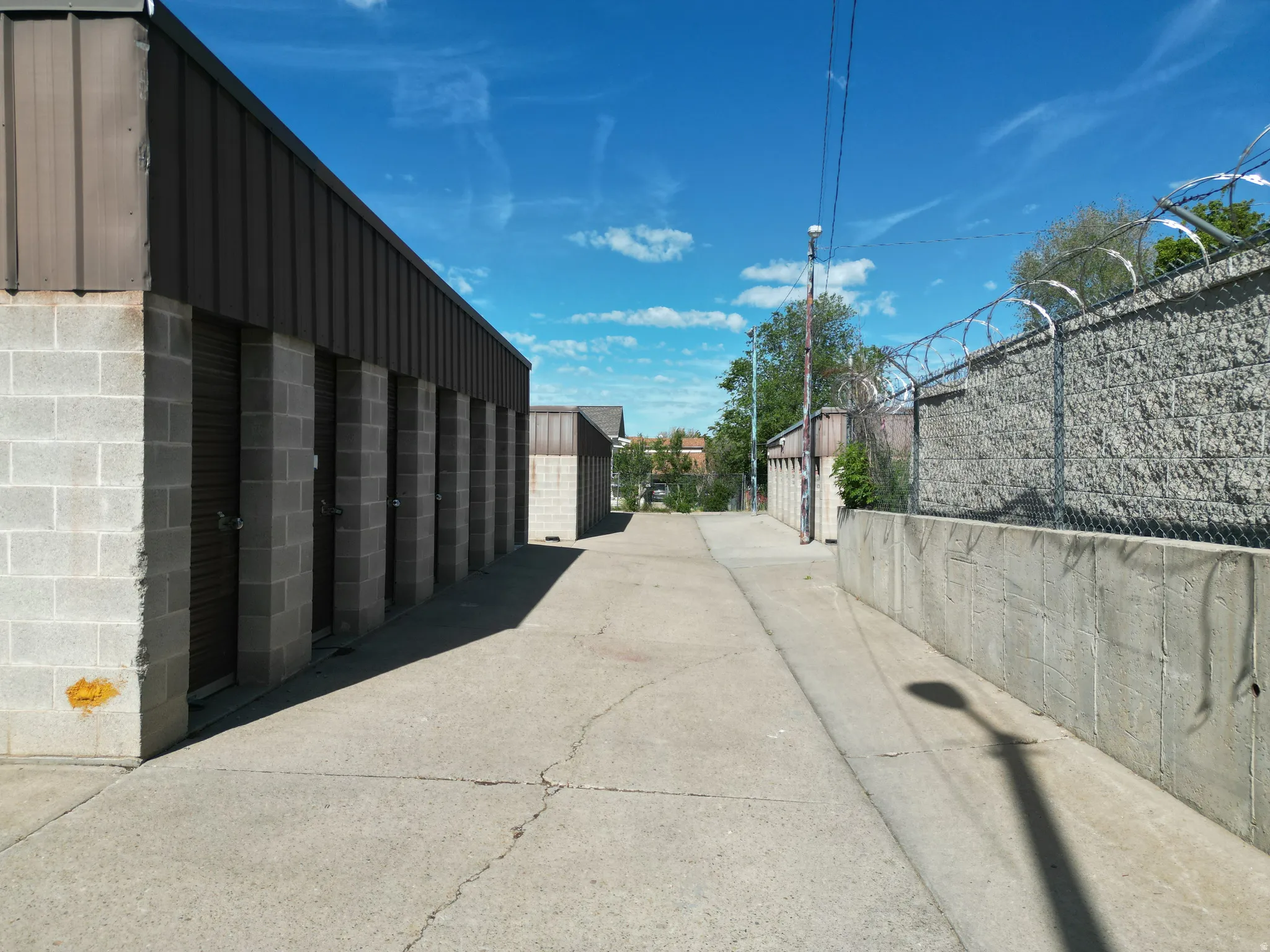 View of concrete alley