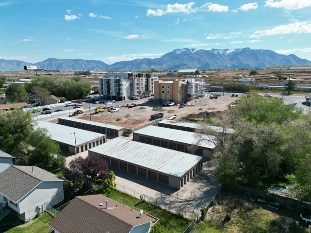 Bird's eye view of a mountainous background and industrial structures