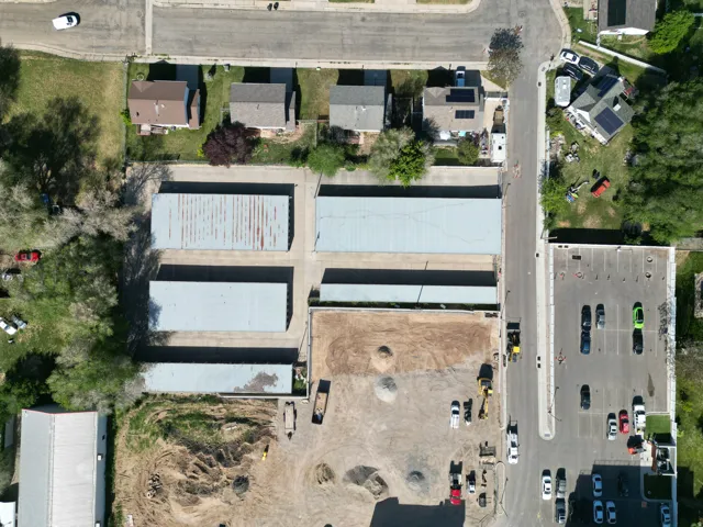 View of property location with nearby suburban area