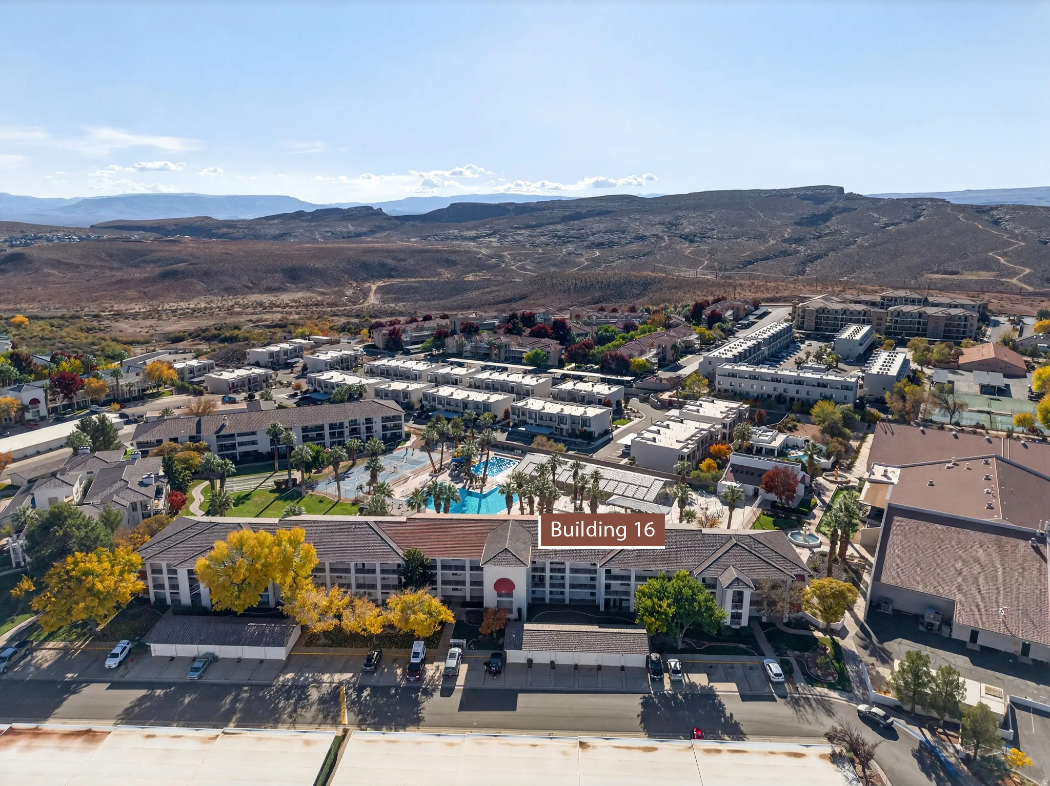 Drone / aerial view of a pool and mountains