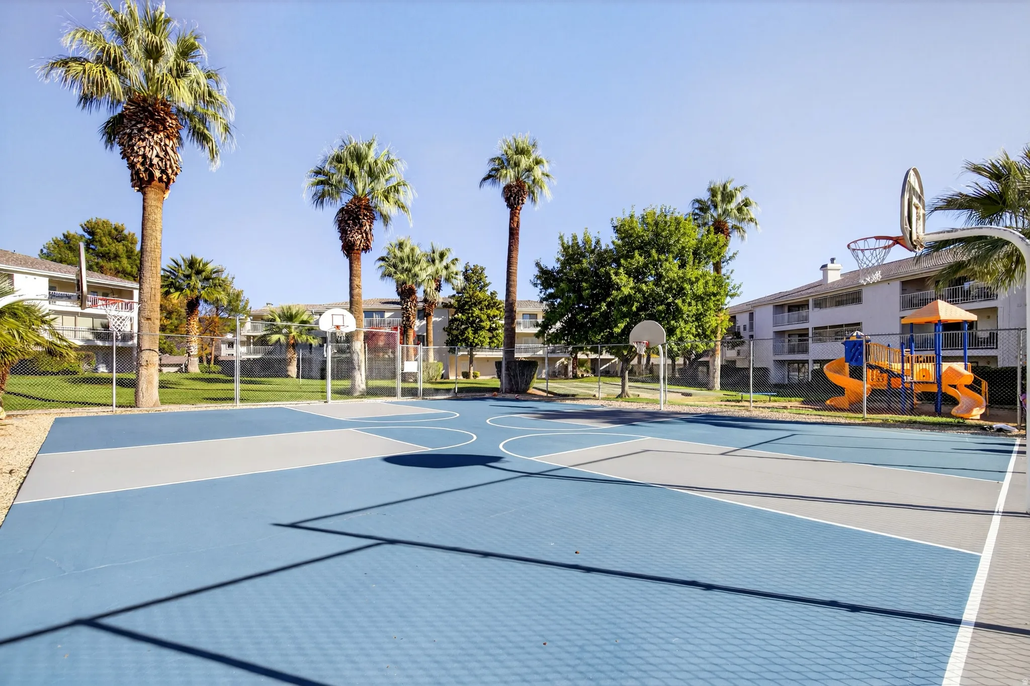 View of sport court featuring community basketball court