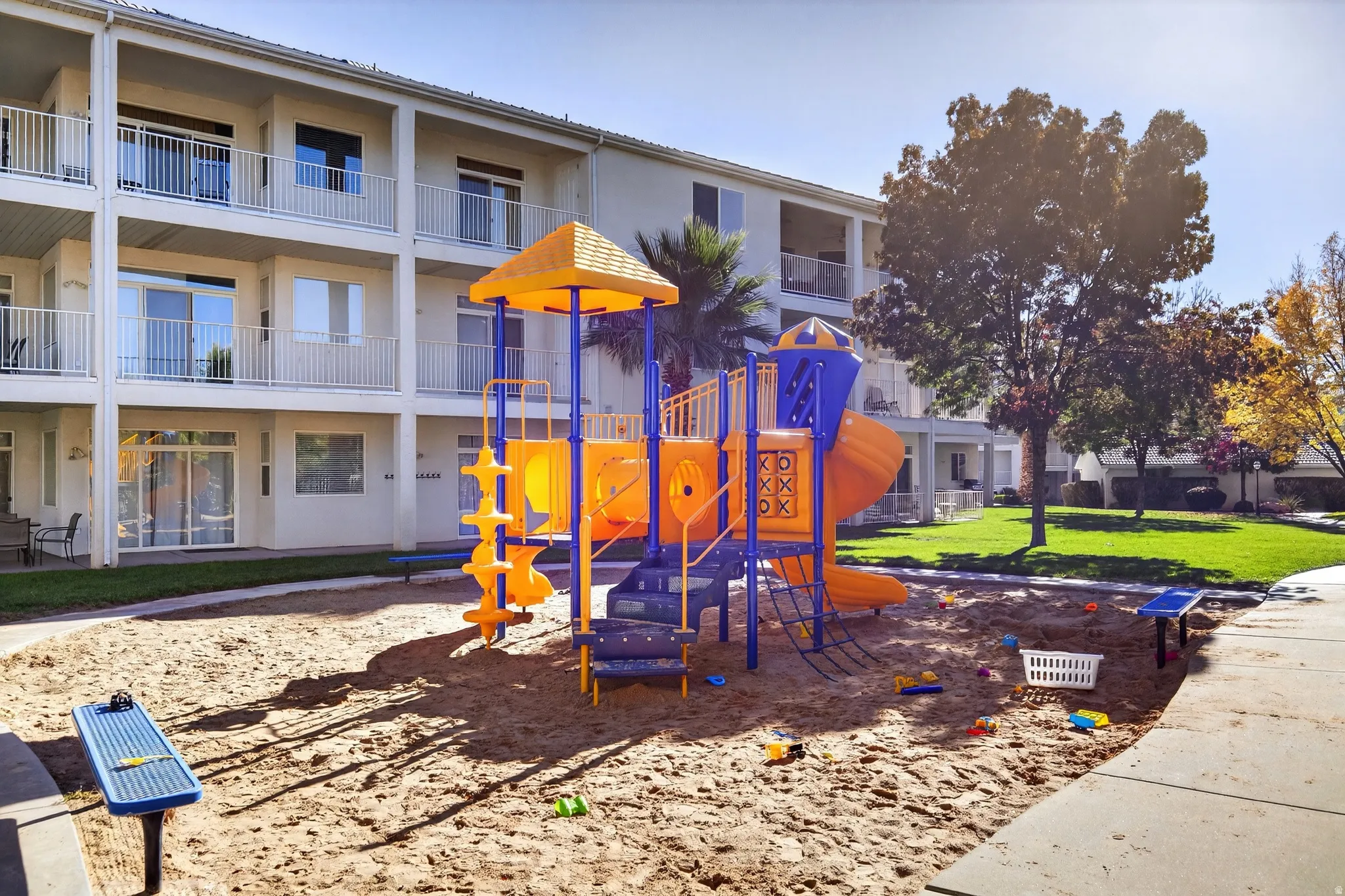 Community playground with a yard